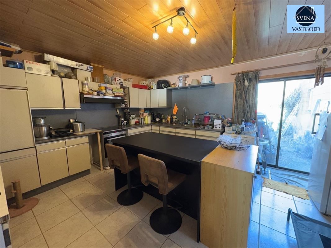 WONING GELEGEN NABIJ CENTRUM HERZELE foto 4