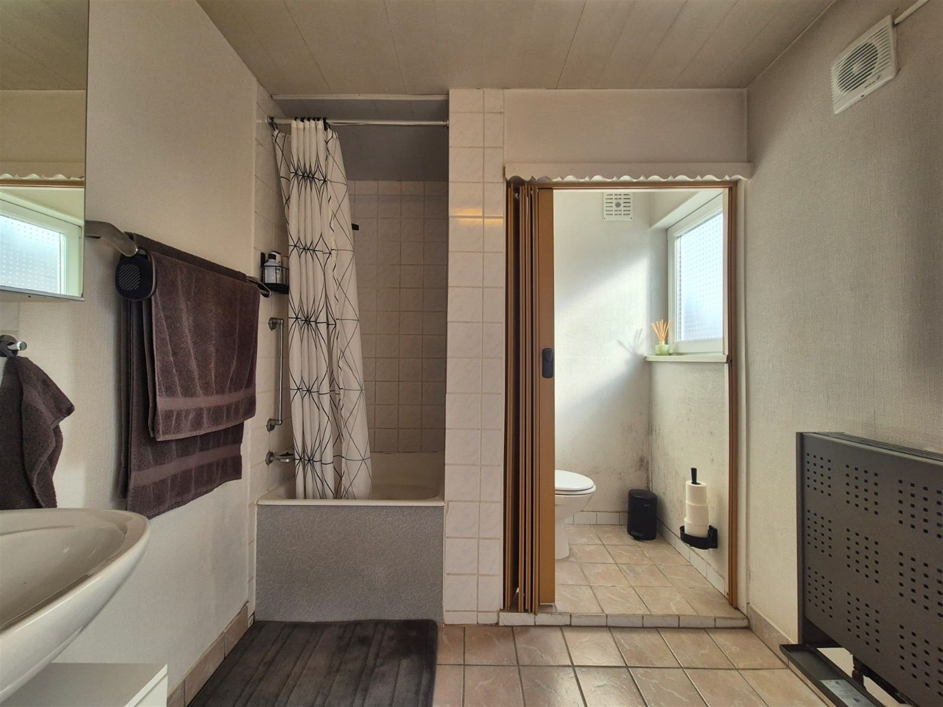 Knusse woning met tuin en garage.  foto 18