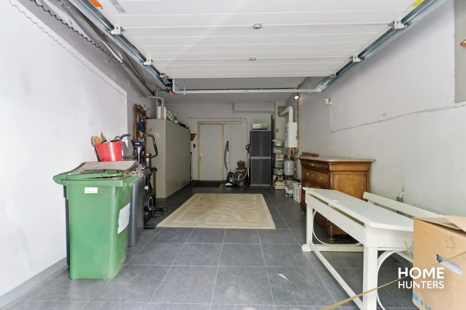 Statige stadswoning met uitzonderlijke volumes, garage en prachtige tuin in hartje Ieper foto 32