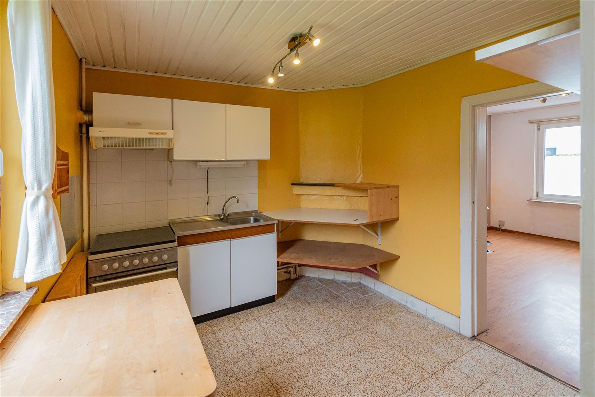 Te renoveren 3-gevel woning te koop in Beersel foto 5