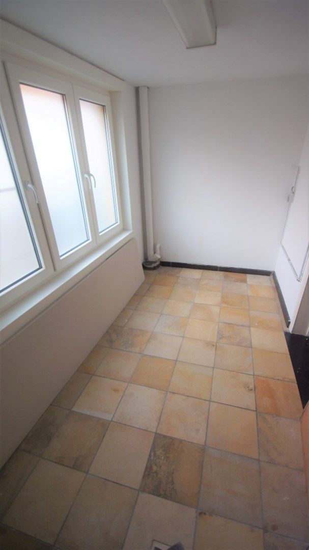 Mooi gelegen woning met tuin/terras, 2 slpks en garage foto 12