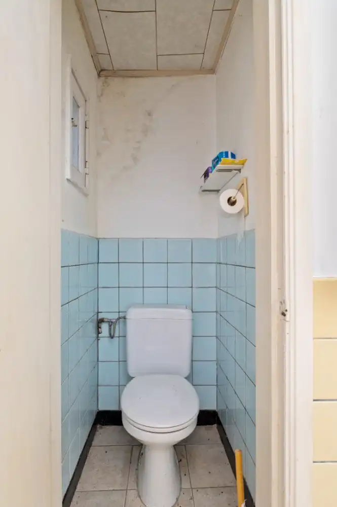 Deels gerenoveerde gezinswoning met 3 à 4 slpk. en tuin foto 10