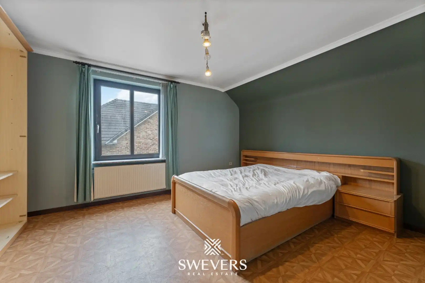 Karaktervolle gezinswoning met veel potentieel op een perceel van 13a55ca in hartje Heusden-Zolder foto 17