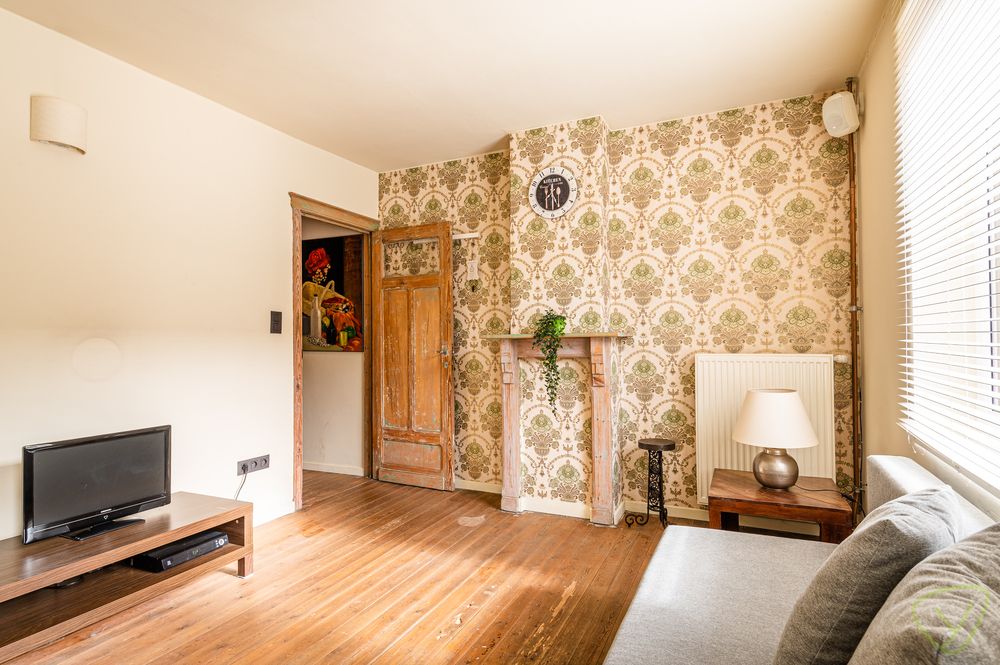 Ruime woning met zonnige tuin en veel potentieel in de Desire Goethalsstraat foto 14