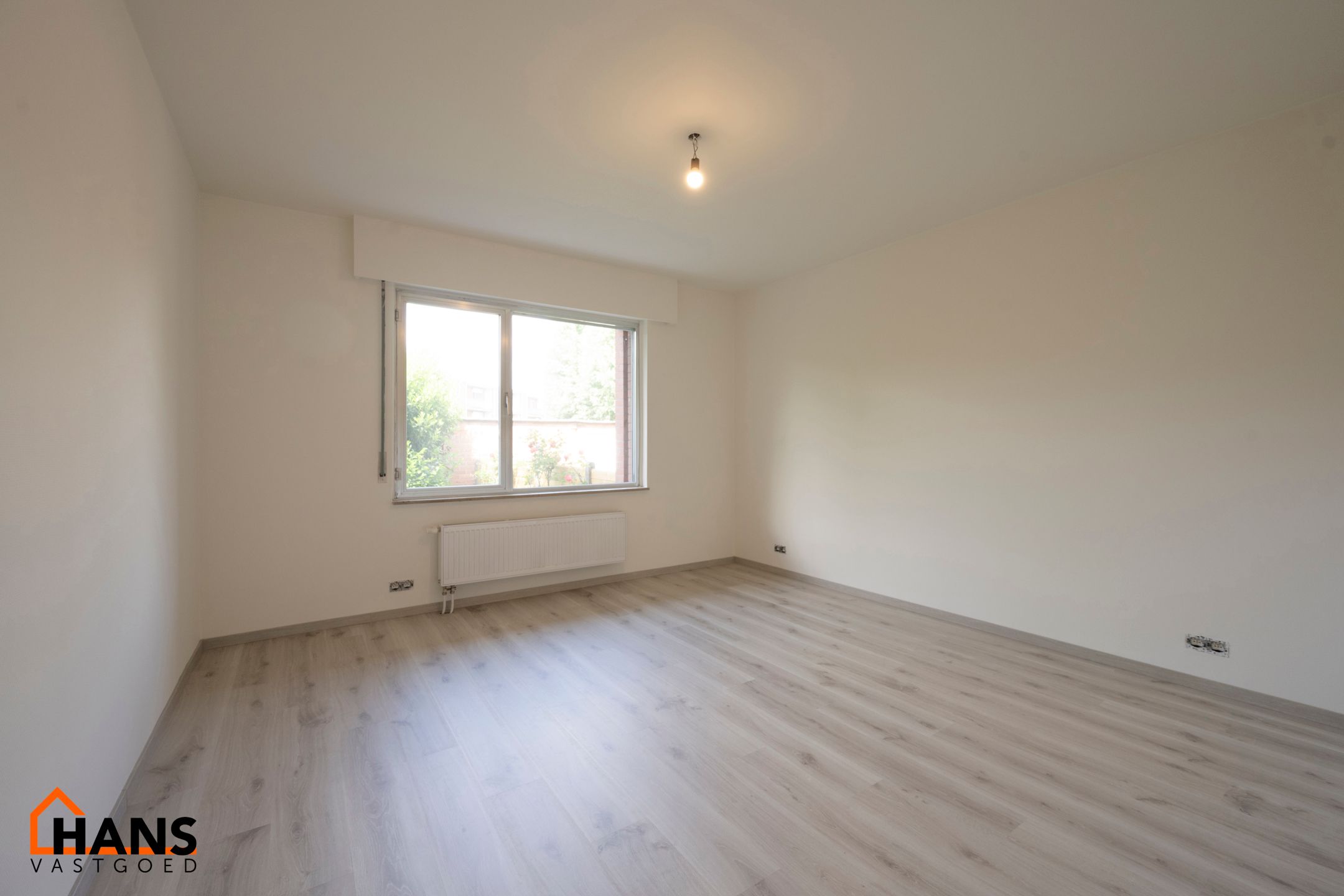 Gerenoveerd gelijkvloers appartement met tuin foto 6