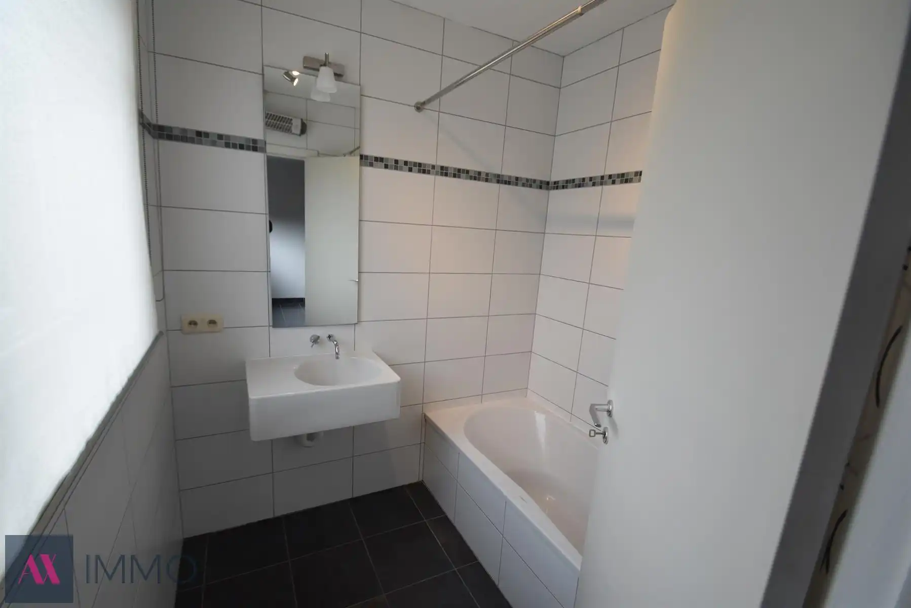 Centraal gelegen 1-slpk-apt met groot terras van 20 m², lift, vrij vanaf 01/12 foto 10