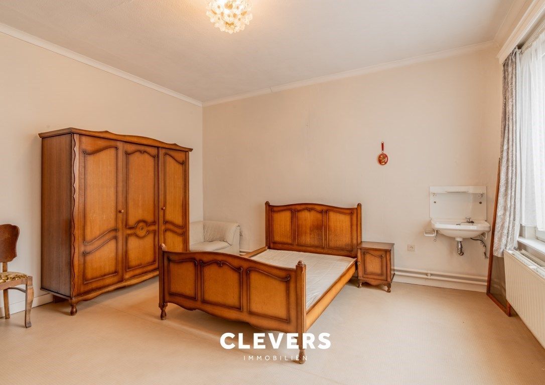 Opbrengsteigendom met lopende handelshuur + 2 appartementen foto 9