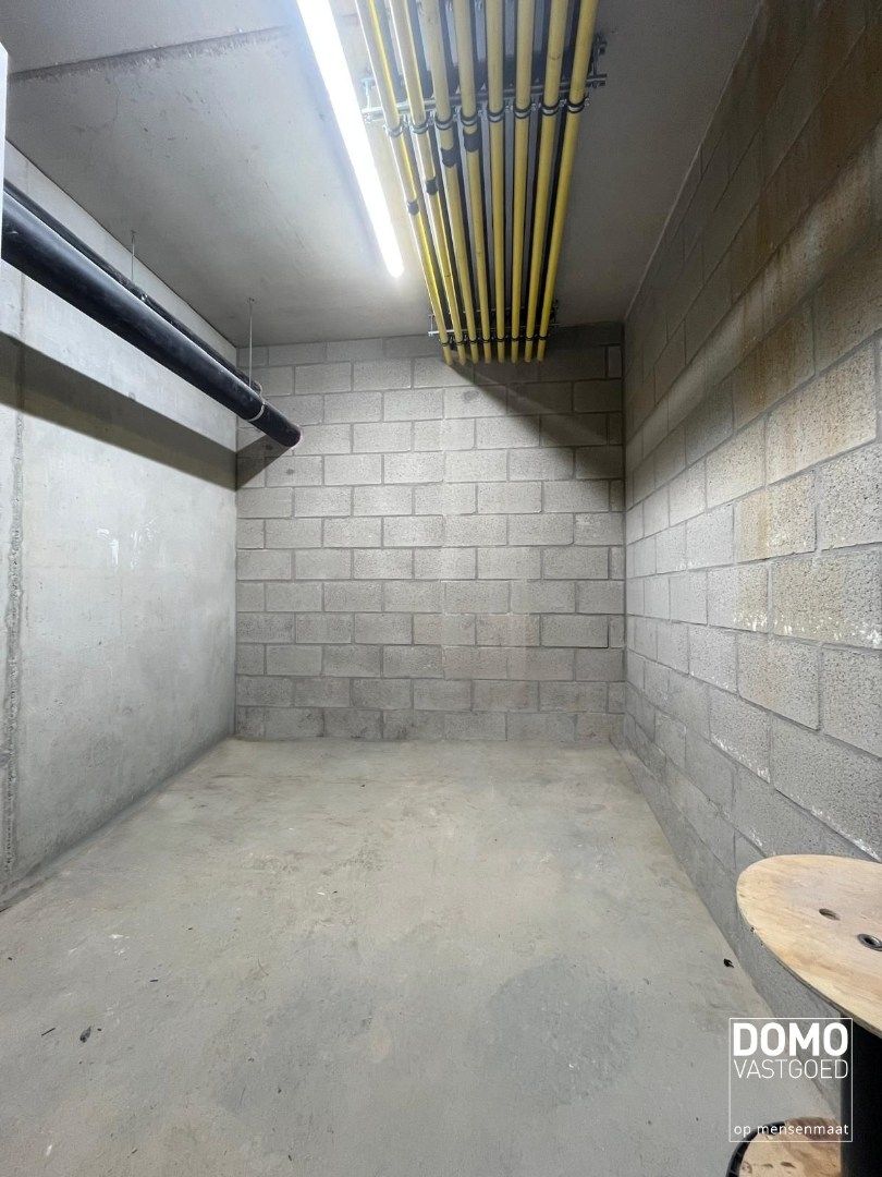 NIEUWBOUW 2 SLAAPKAMER APPARTEMENT MET TERRAS, AUTOSTANDPLAATS EN KELDERBERGING TE KERMT foto 15