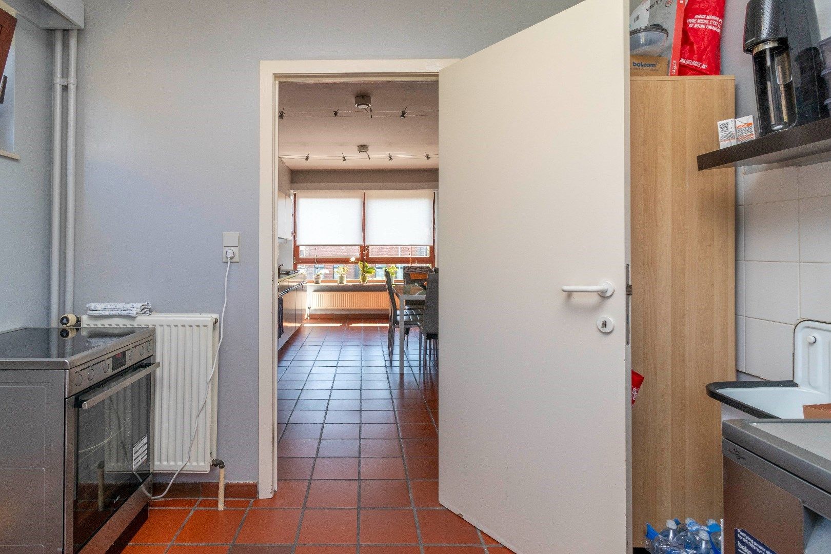 Ruim duplexappartement met gelijkvloerse handelsruimte foto 9