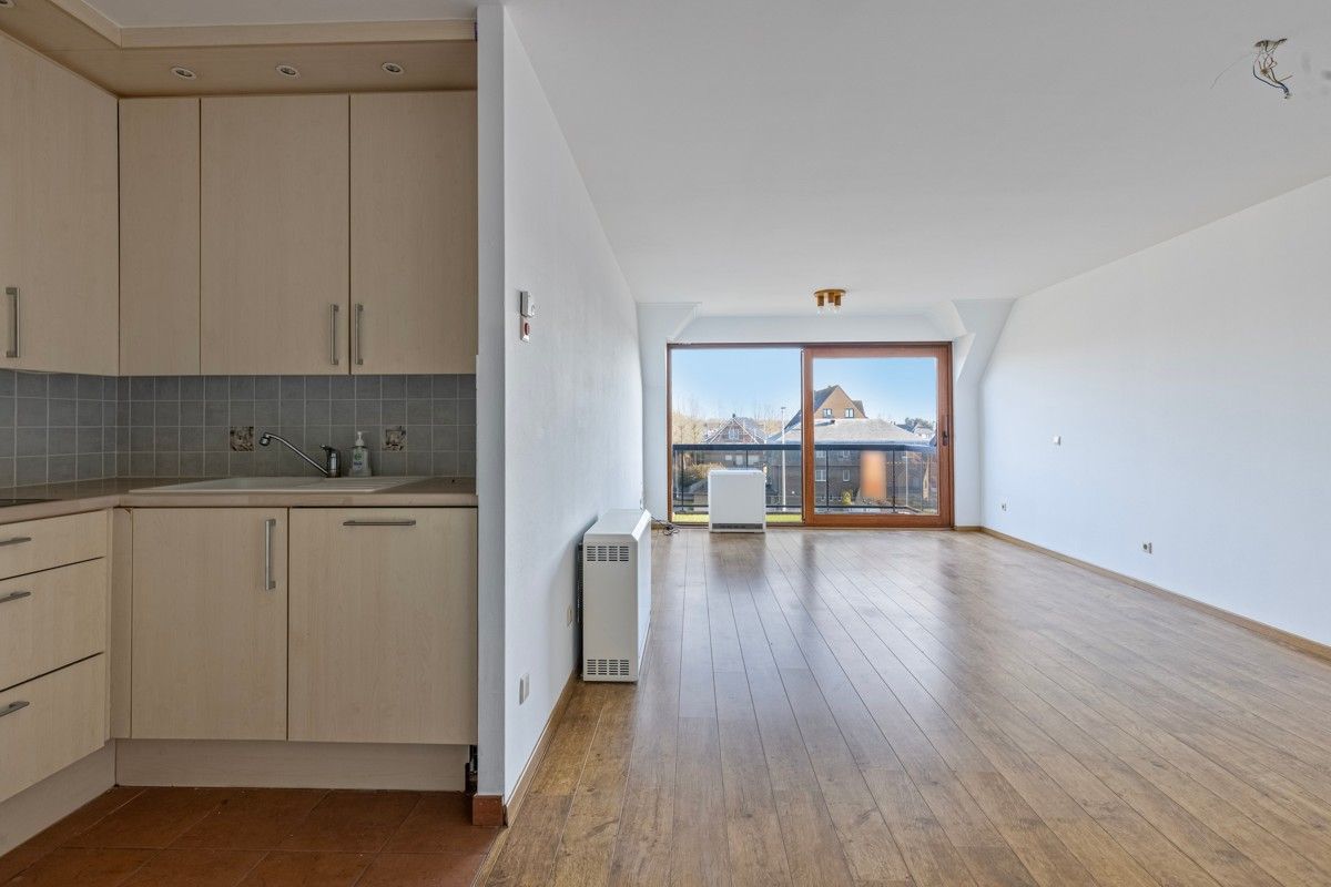 Ruim appartement met drie slaapkamers en parking te koop! foto 6