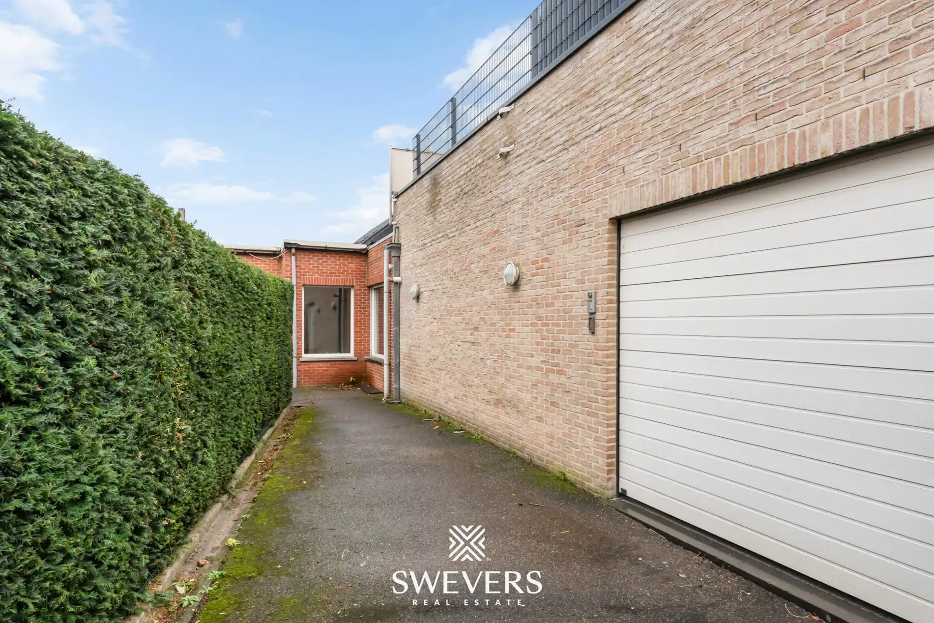 Opbrengsteigendom met handelspand, ruim appartement en uitbreidingspotentieel in hartje Heusden-Zolder foto 49