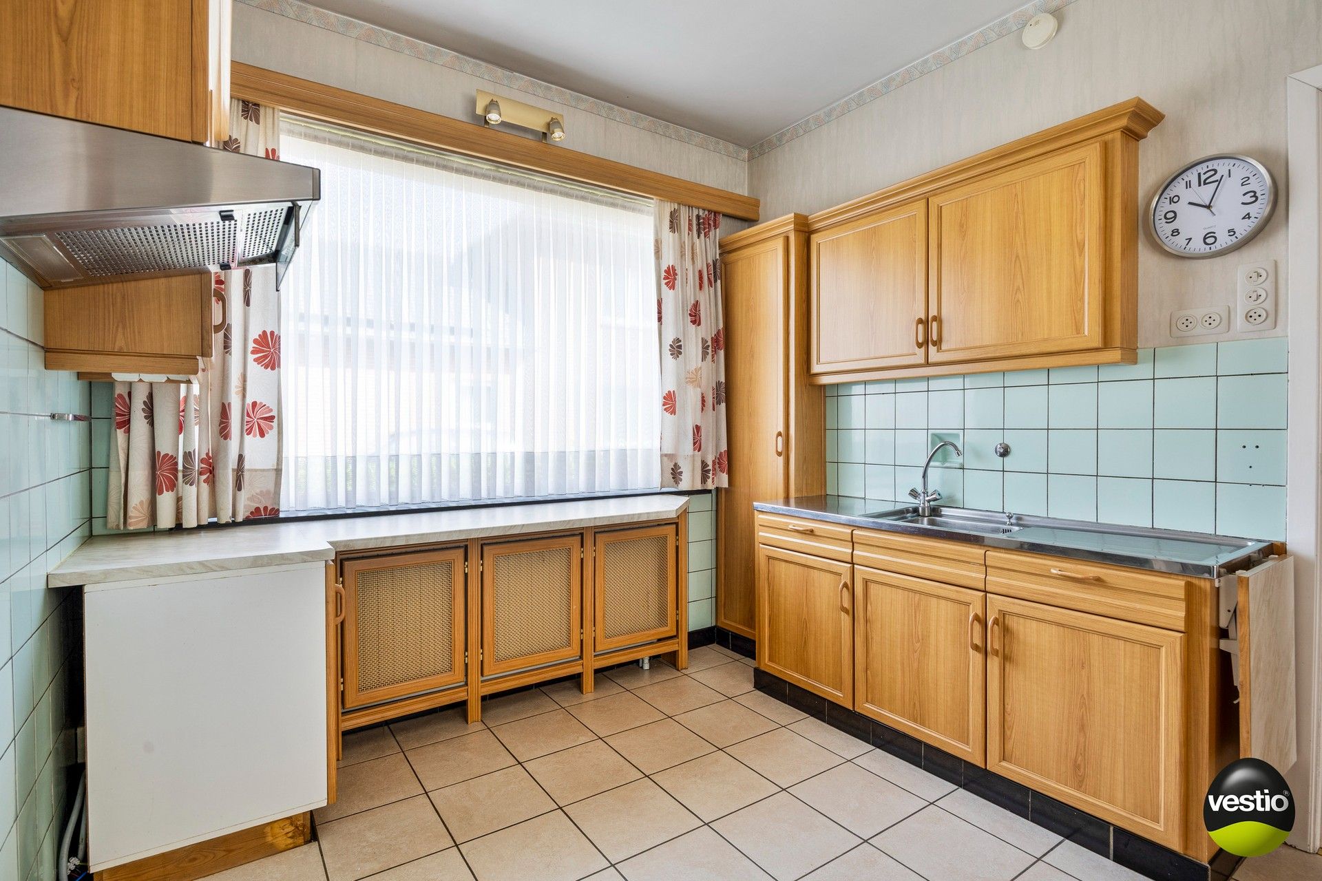Charmante gezinswoning met drie slaapkamers op rustige, centrale ligging te Genk foto 8