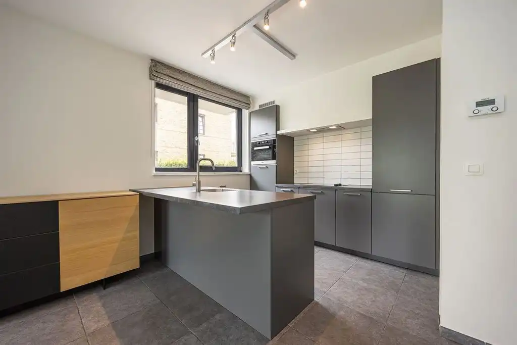 Instapklaar gelijkvloers appartement met tuin foto 7