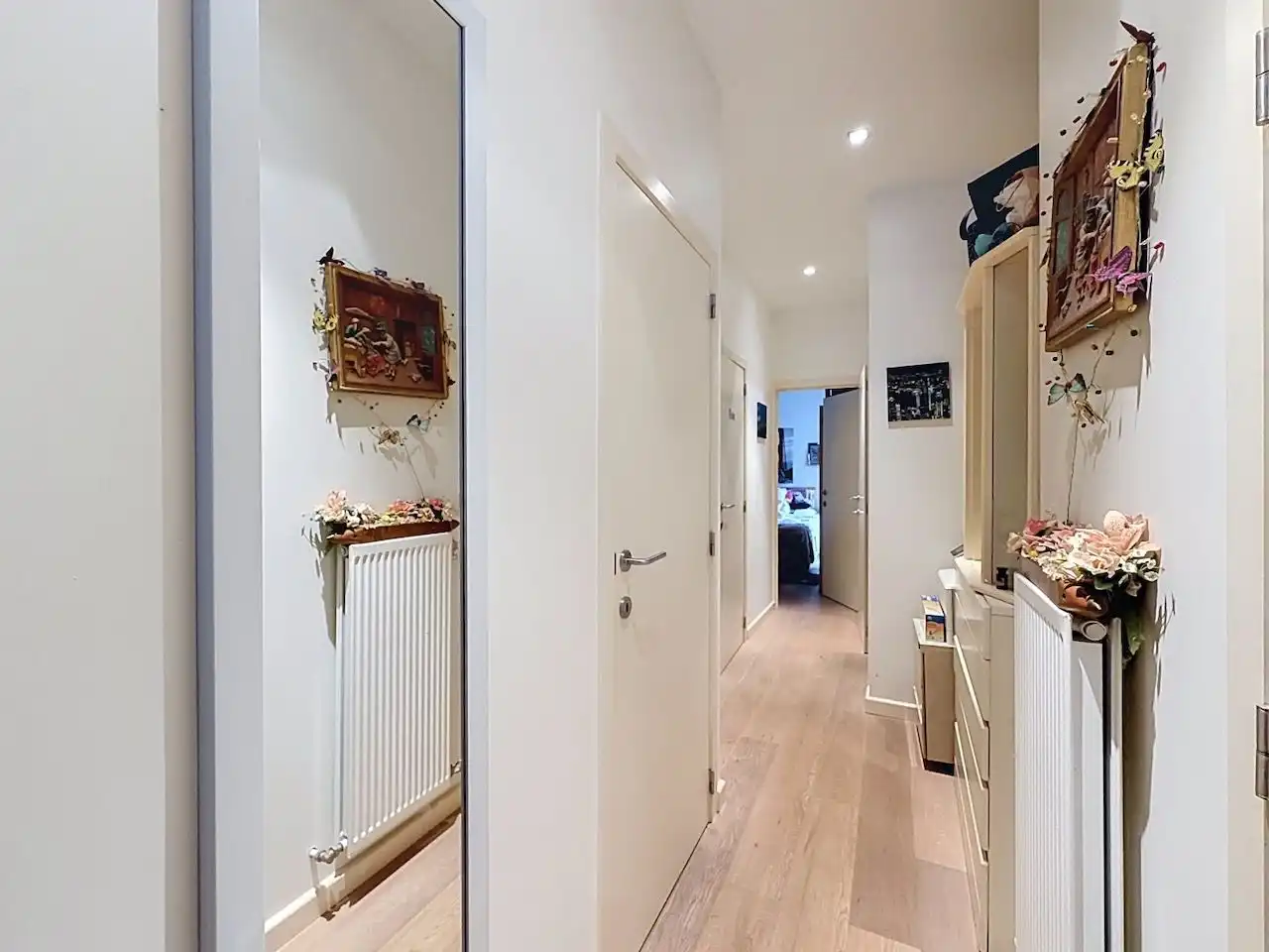Verhoogd gelijkvloers appartement met twee slaapkamers en achterliggend terras nabij de Kinkhoorn en Zeedijk foto 4