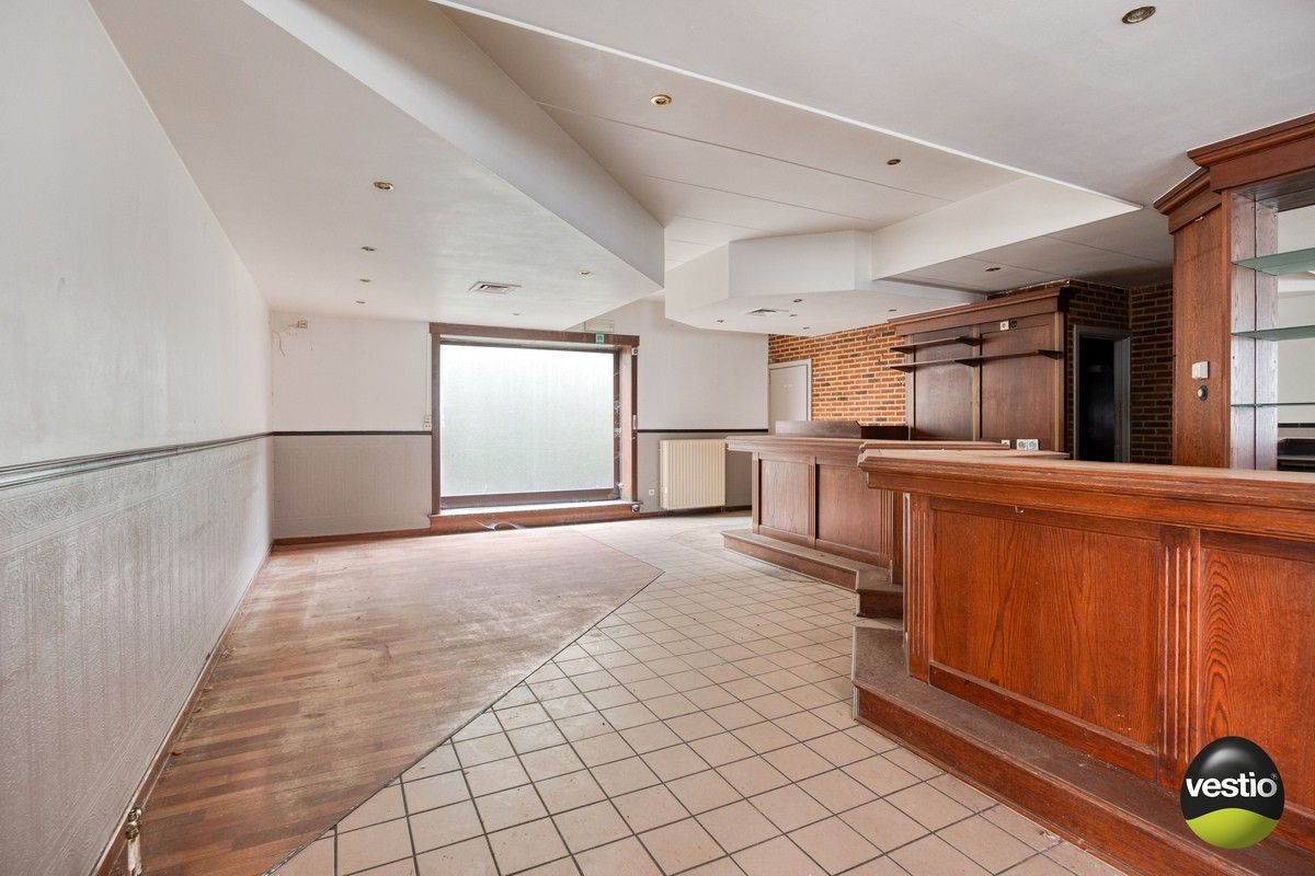 Handelspand met woonst / projectopportuniteit aan de Luikersteenweg. foto 8