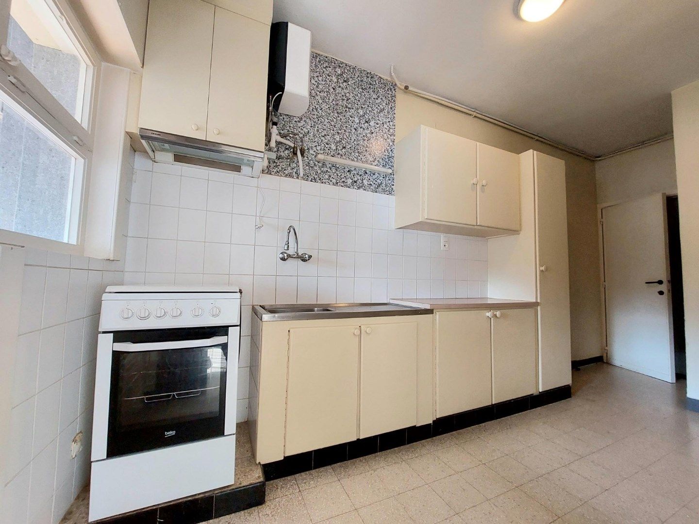 Gelijkvloersappartement met terras en garage foto 6