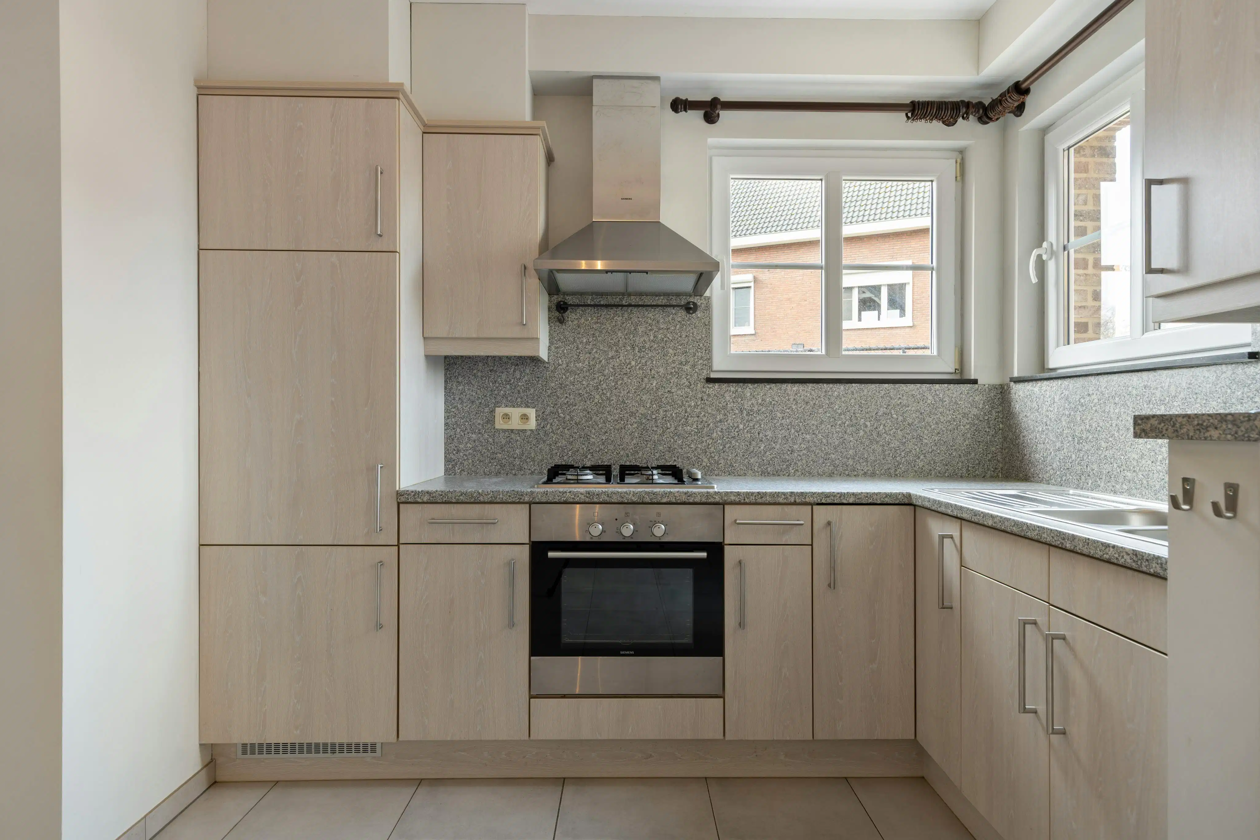 Instapklaar gelijkvloers app met terras en autostaanplaats! foto 7