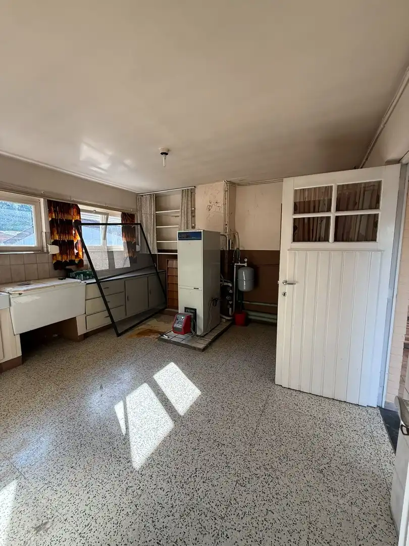 Ruime woning met 2 slaapkamers, veranda en volledig omheinde tuin te Heppen foto 16