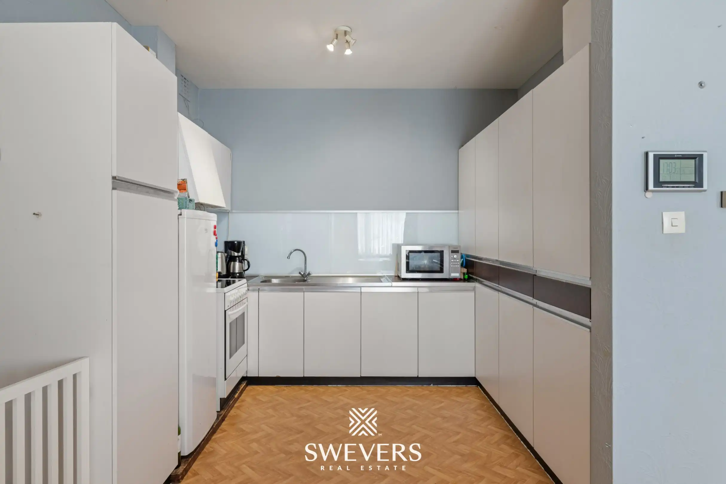 Gelijkvloers appartement met 2 slaapkamers en garagebox in centrum Beringen foto 7