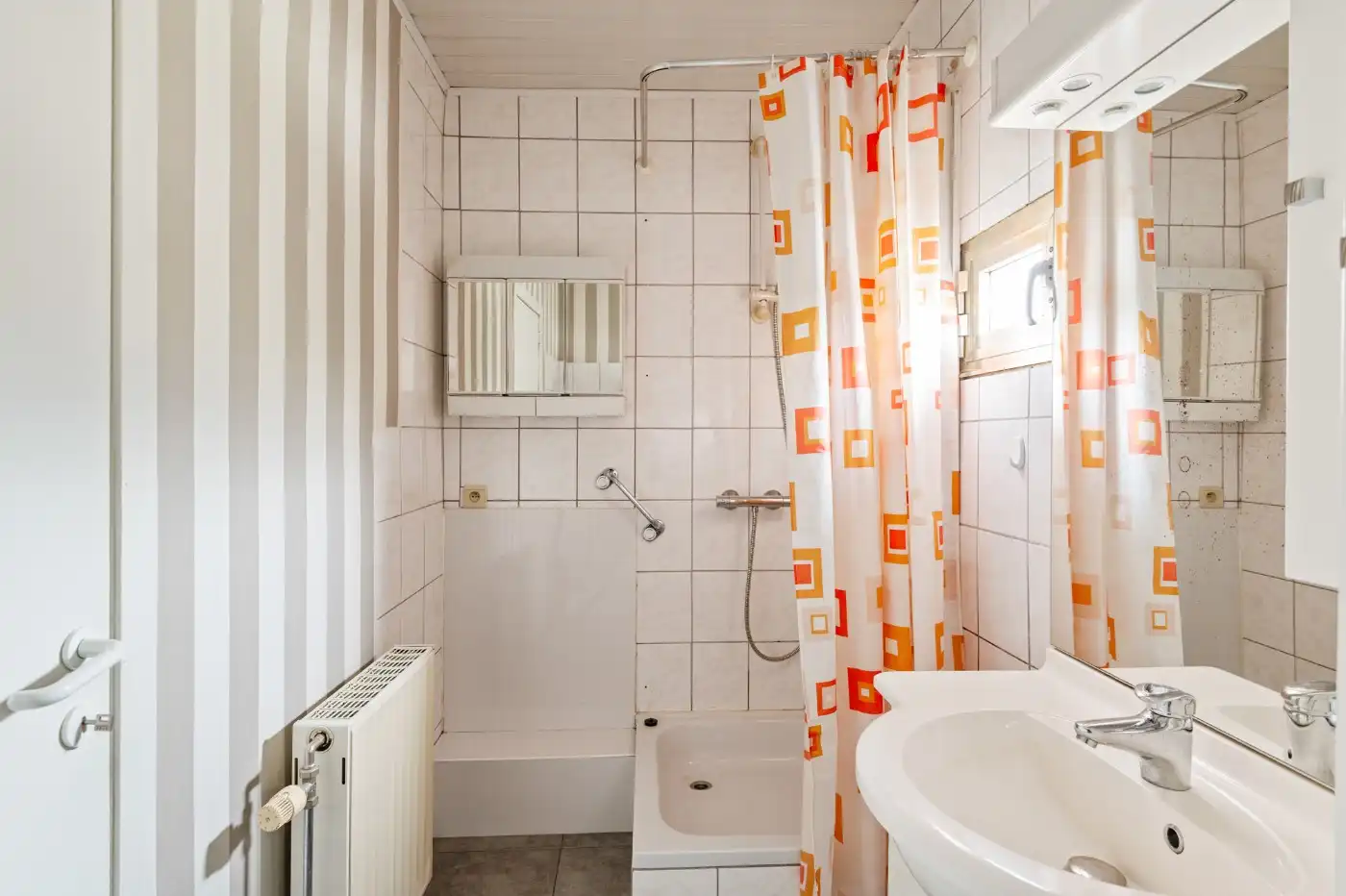 Leuke starterswoning met 2 slpk., garage en gezellig west-tuintje foto 10