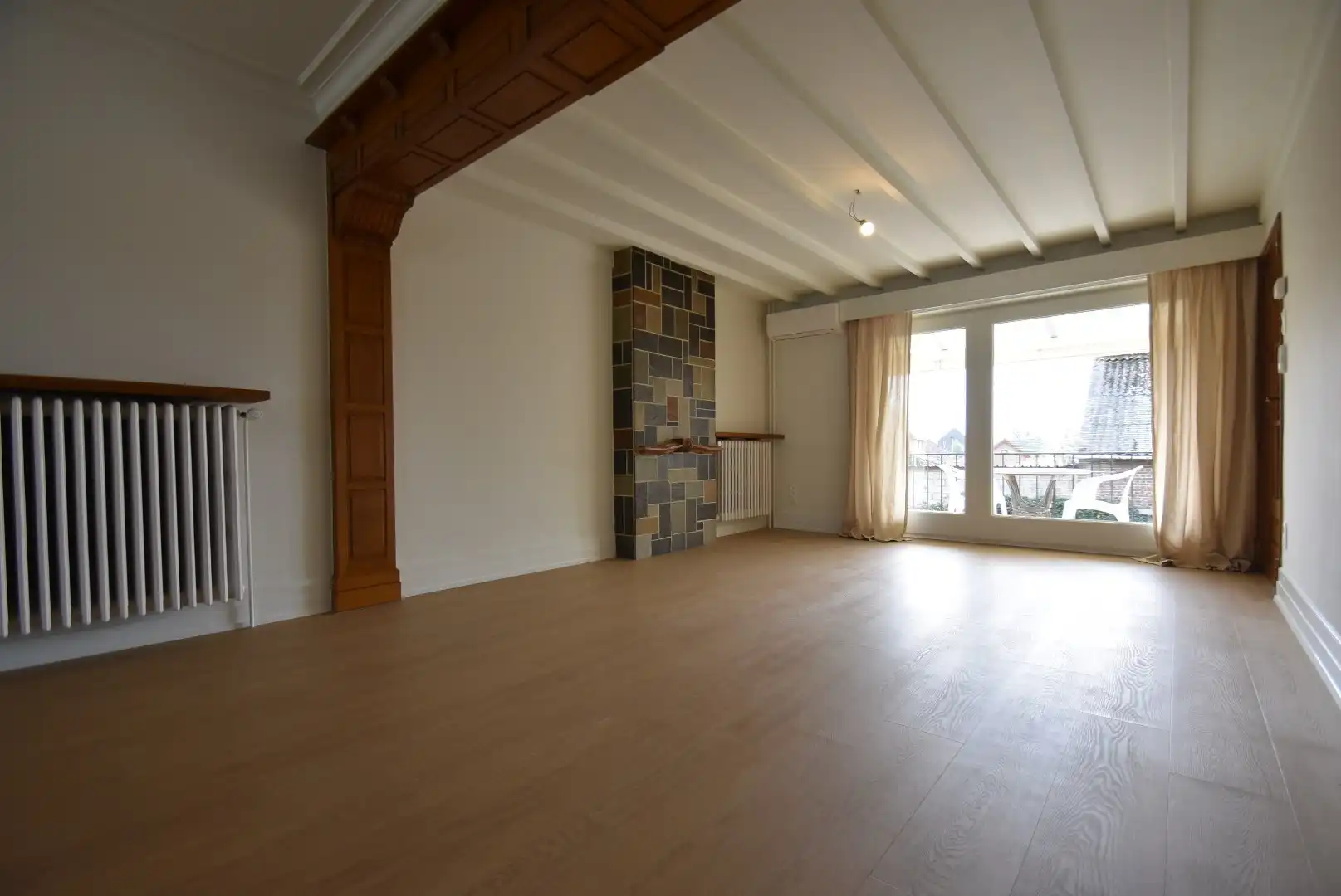 Knappe rijwoning met inpandige garage en mooie tuin in het centrum van Riemst foto 6