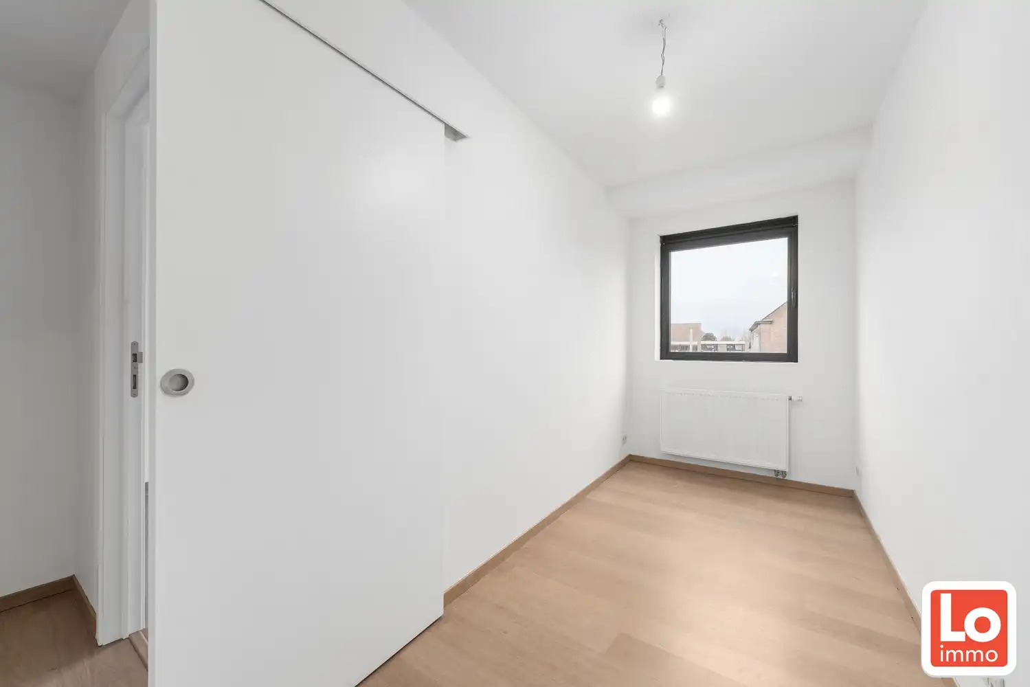 Mooi appartement met 2 slaapkamers en zuid-gericht terras in centrum Lochristi foto 7