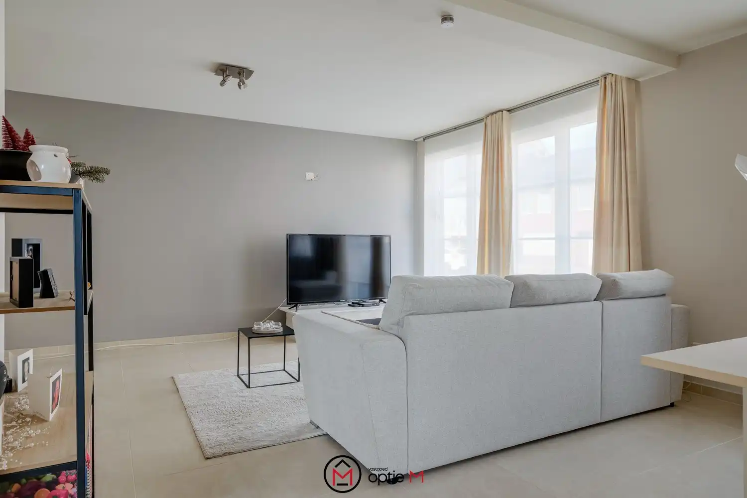 Gelijkvloers appartement te koop in Bilzen – Ruim wonen met terras, carport en kelderberging foto 8