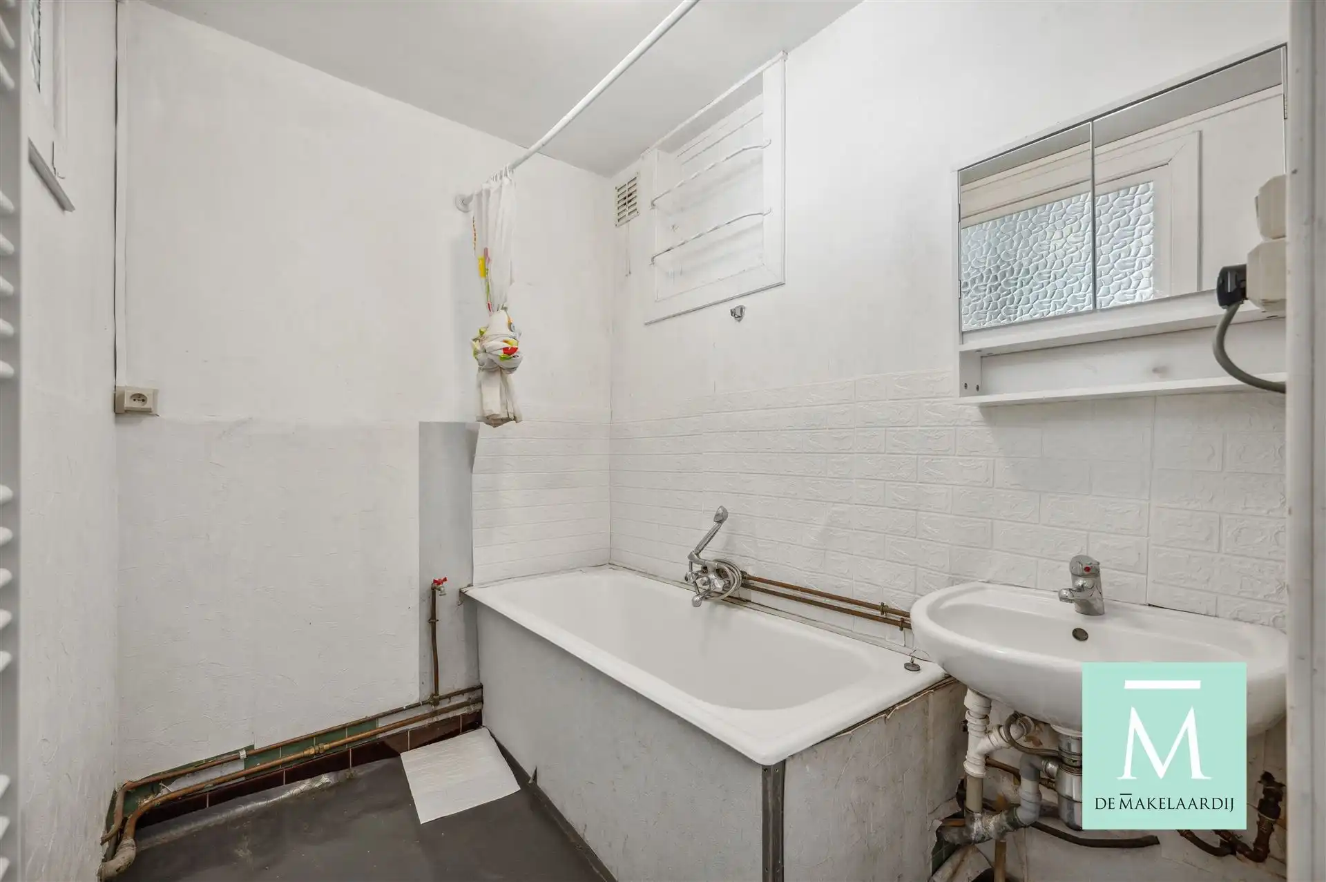 Appartementsgebouw met handelspand op het gelijkvloers foto 22