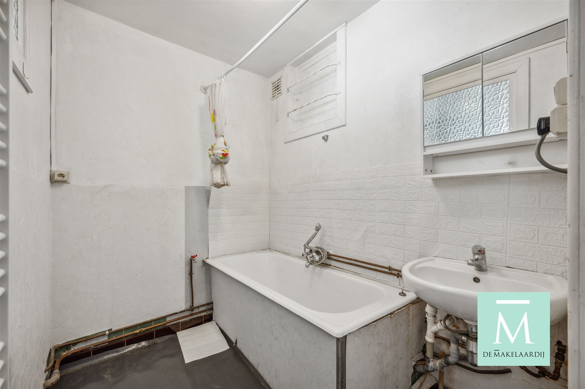 Appartementsgebouw met handelspand op het gelijkvloers foto 22