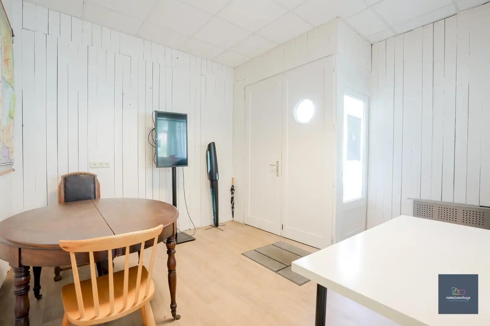 Karaktervolle eigendom met handelsruimte en renovatiepotentieel foto 12