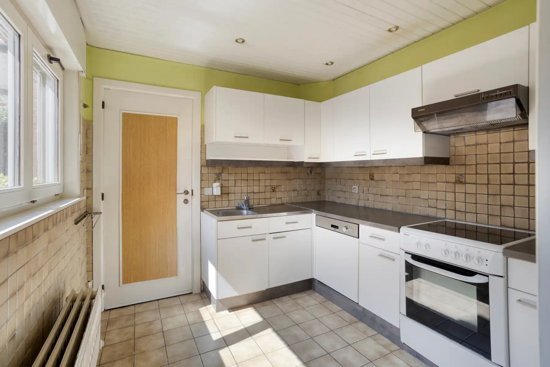 Ruime gezinswoning met potentiële bouwgrond te Mariaburg. foto 10