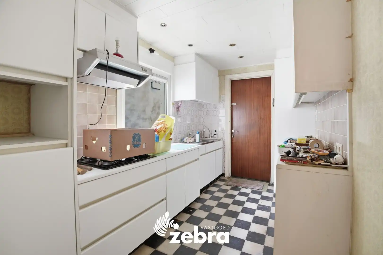 Te renoveren woning met tuin op centrale ligging in Tielt! foto 7