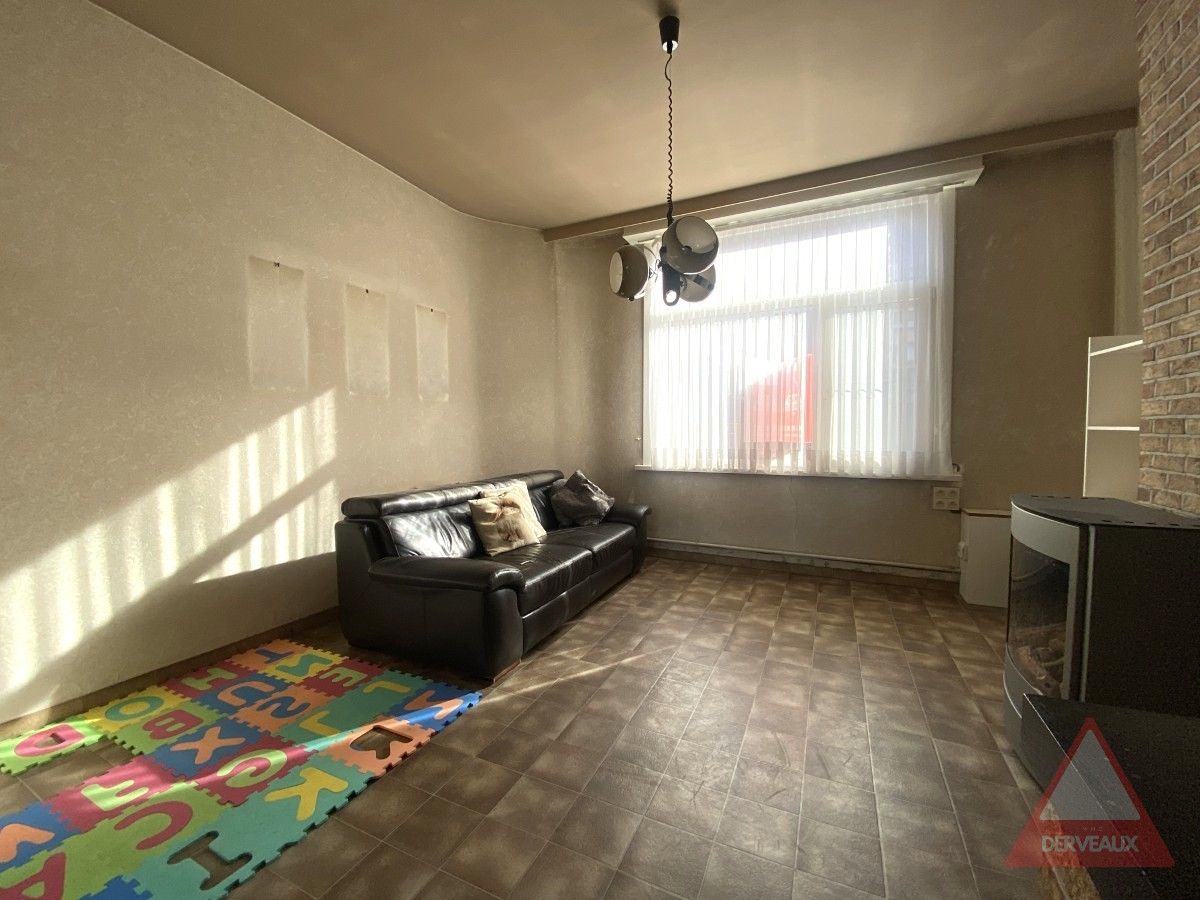 Zonnebeke - Woning met diepe tuin en dubbele garage in het centrum foto 4