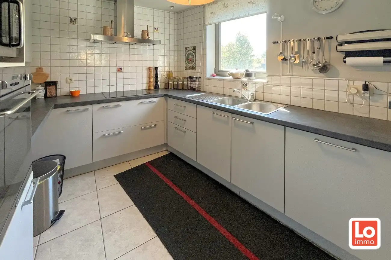 VERKOCHT! Ruim en gezellig appartement met garage in het centrum Lochristi! foto 7