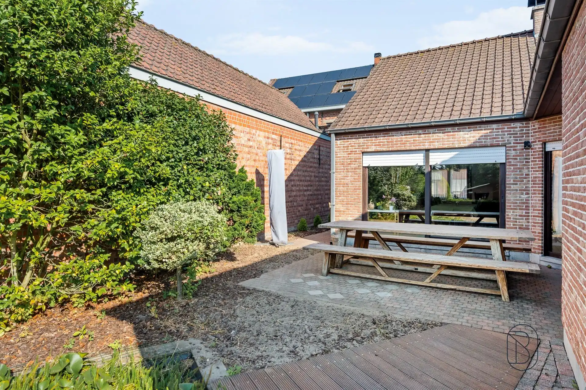 Instapklare woning met grote aangename tuin.  foto 16
