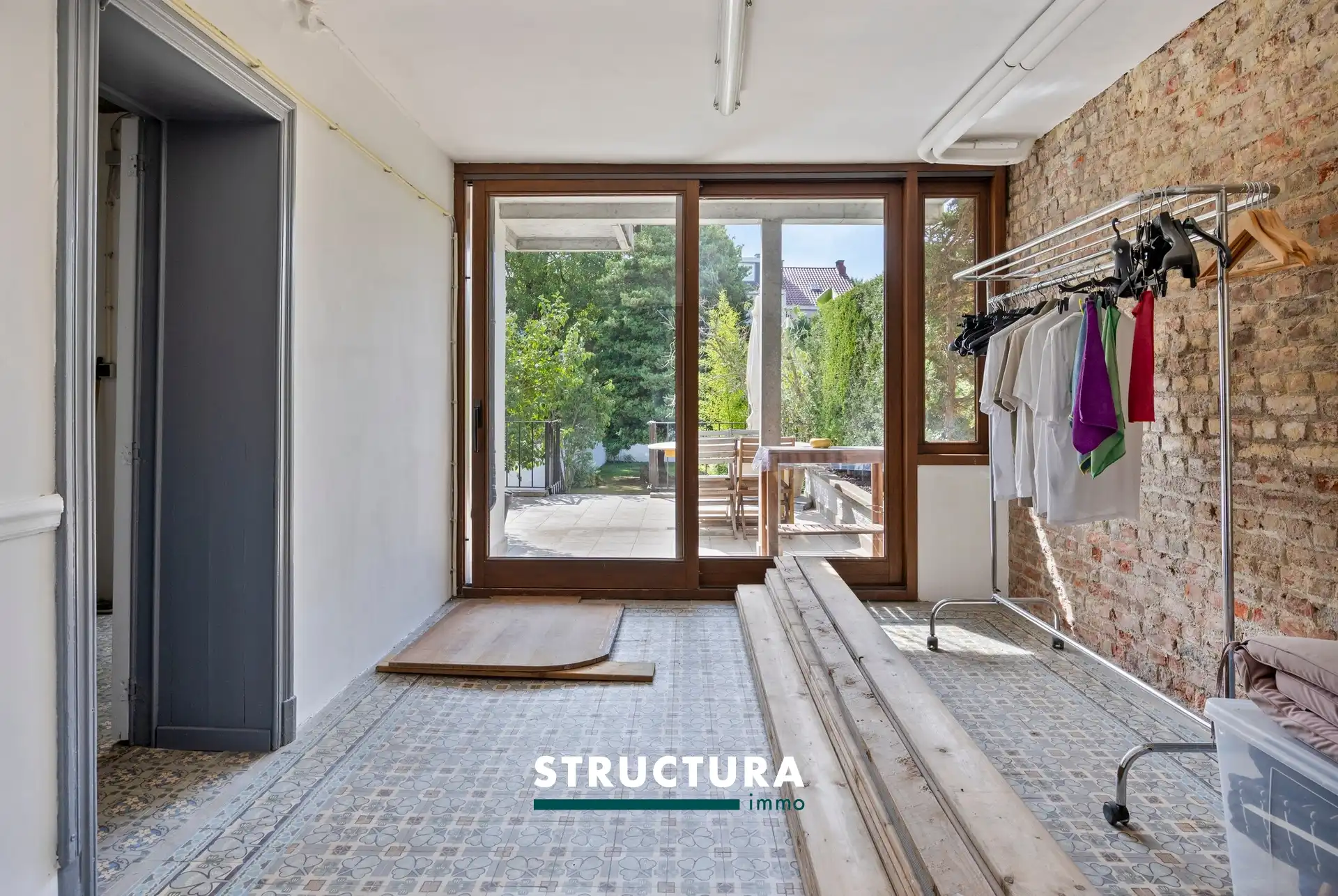 Ruime en lichtrijke woning met een aangename zuidgerichte tuin. foto 30