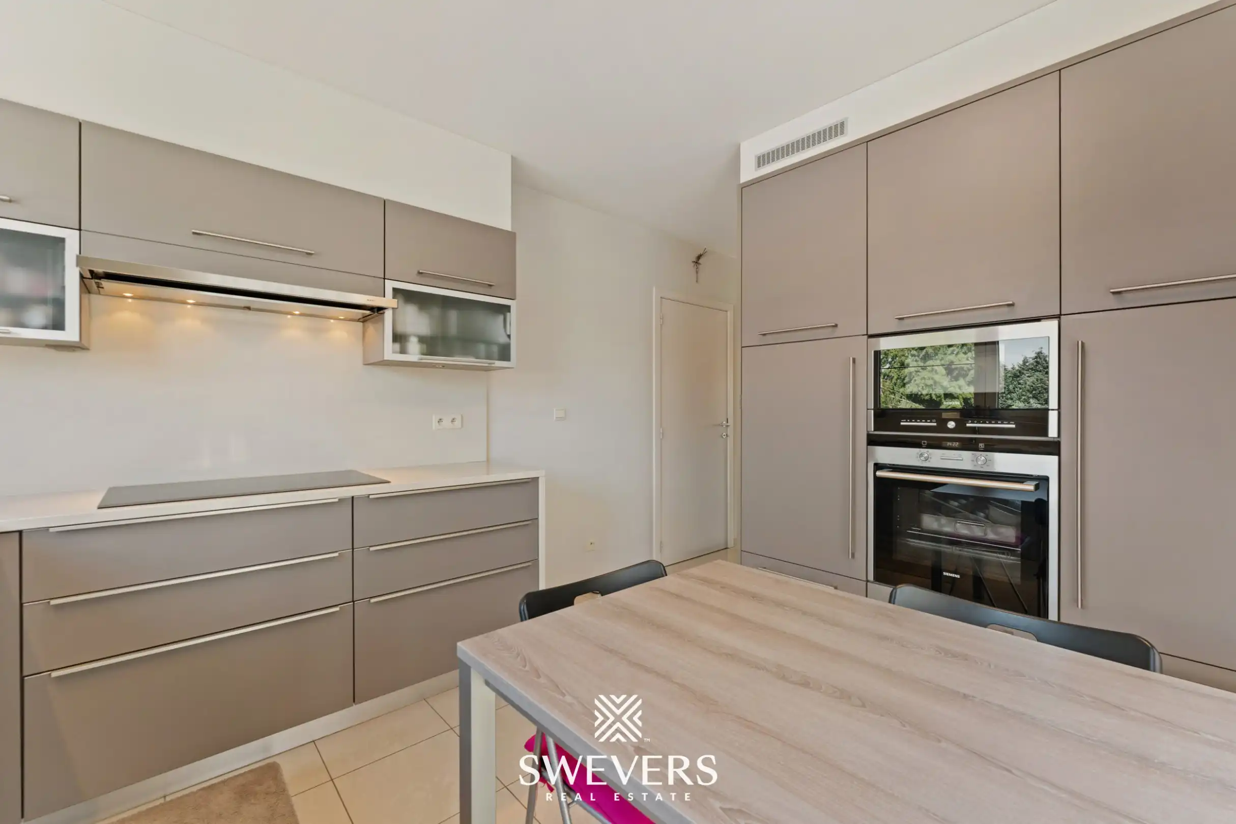 Instapklaar, lichtrijk duplex-appartement met ruim terras in hartje Helchteren foto 13