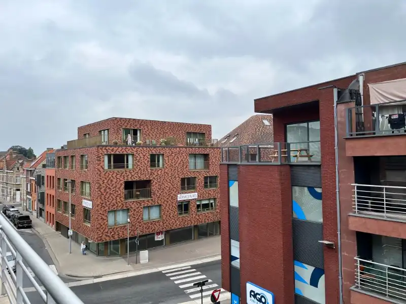 Centrum gelegen app. met 2 slpkms en garage foto 17