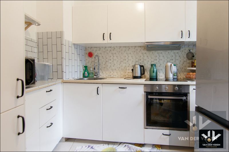 Gerenoveerd appartement met 2 slaapkamers inclusief ruime autostaanplaats in charmante stad Diest foto {{pictureIndex}}