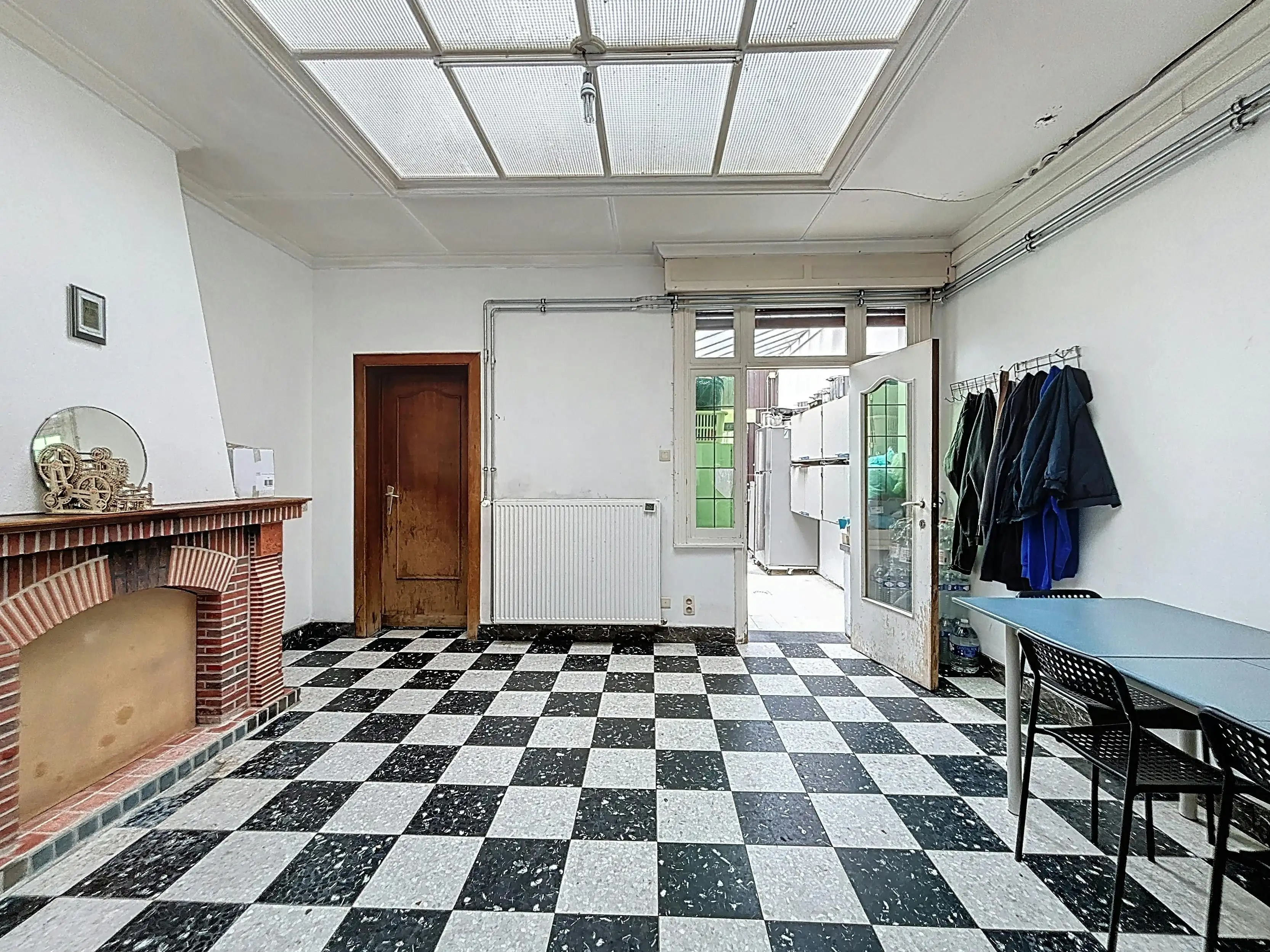 Te renoveren woning te koop in Kortrijk!  foto 4