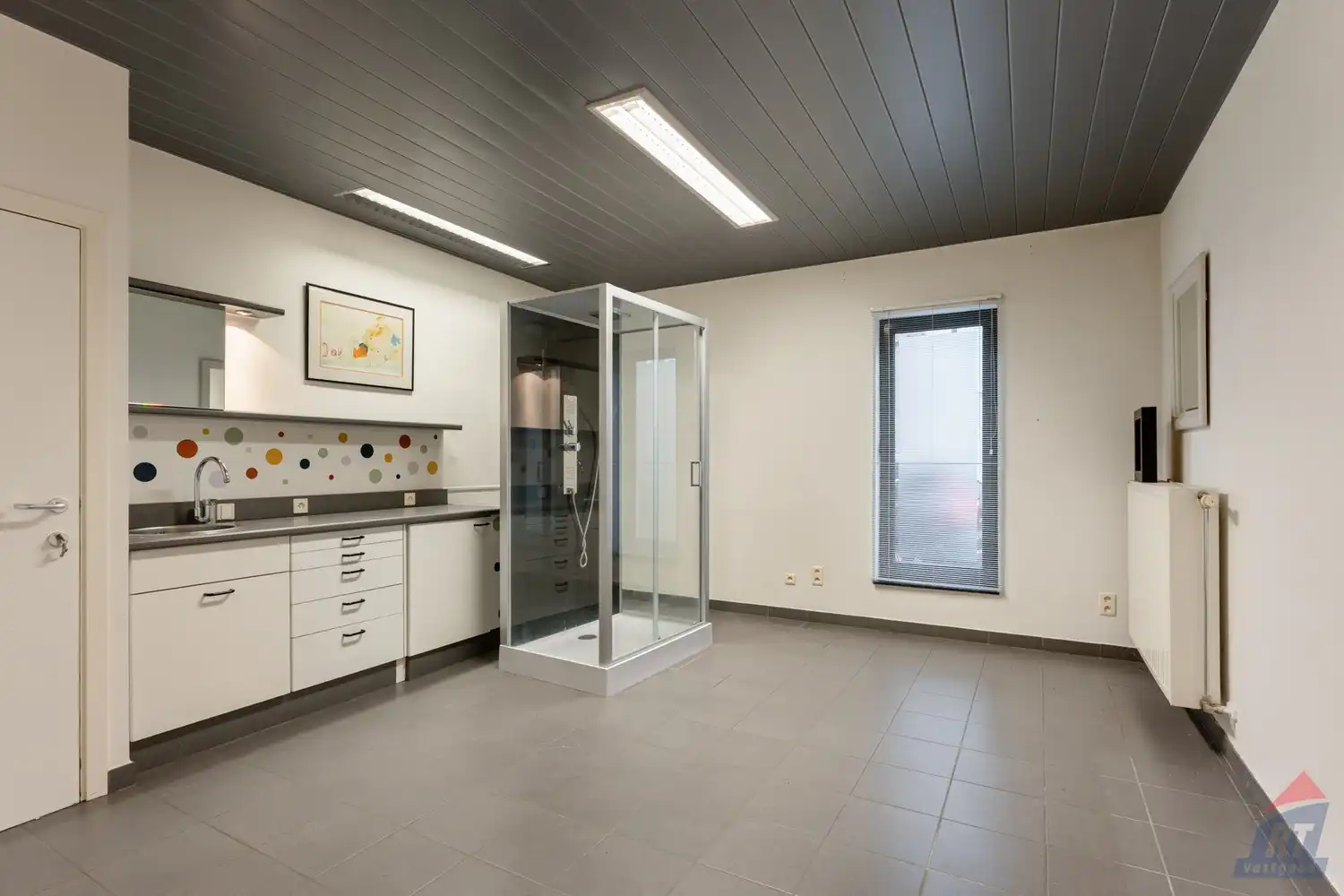 Veelzijdig pand met praktijkruimte en duplex appartement op toplocatie in Sint-Truiden foto 13