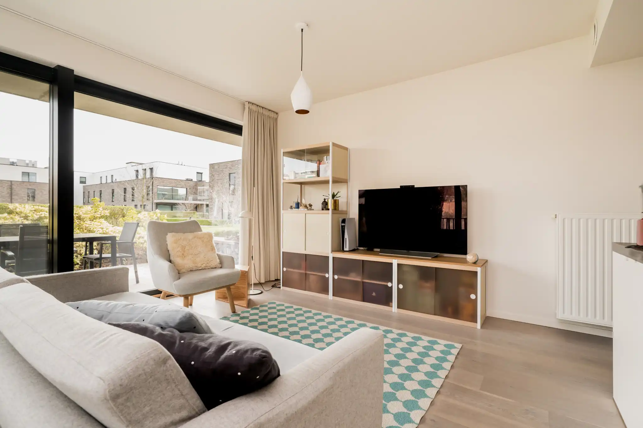 Stijlvol gelijkvloers appartement met 3 slaapkamers en ruim terras in groene, autoluwe woonomgeving foto 9