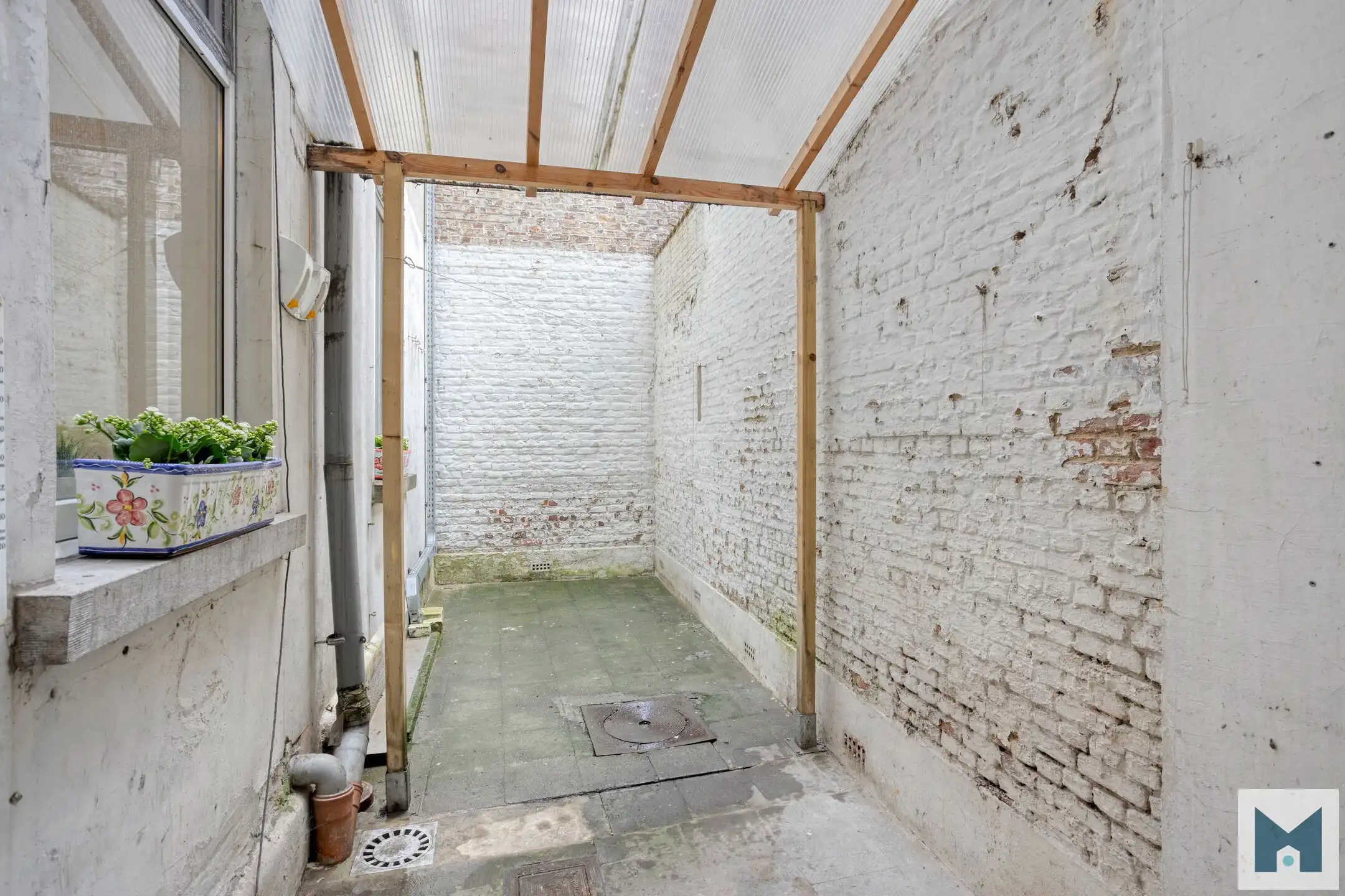 Ruim gelijkvloers appartement met 2 slpks en ruime atelier! foto 15