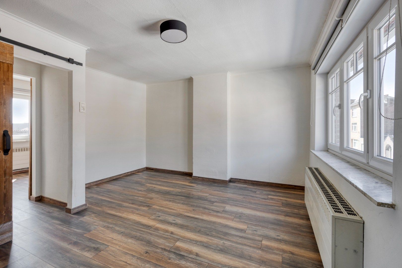 Gezellig ingerichte woning met hobbyruimte en tuin + toegang achterom foto 16