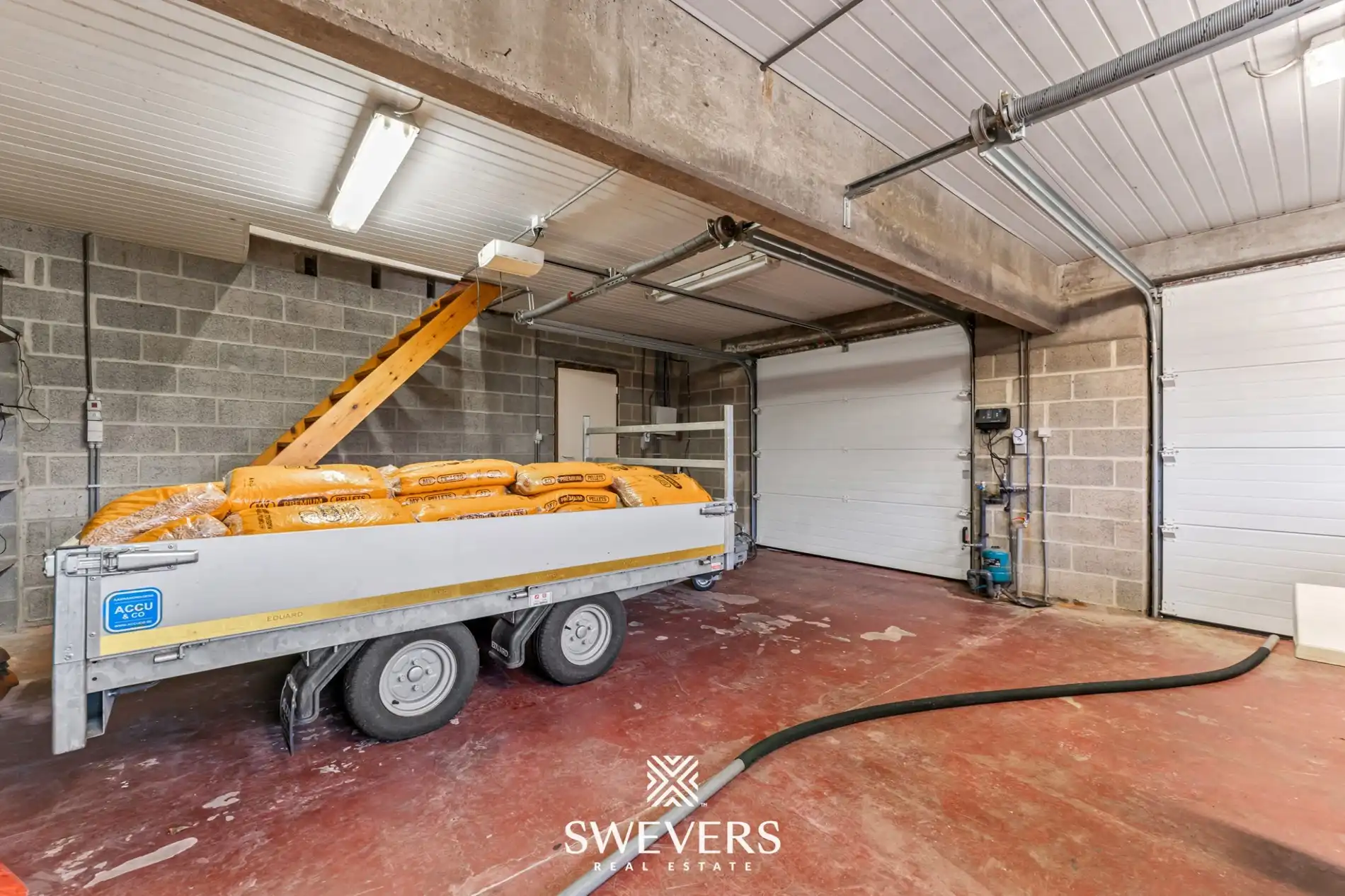 Instapklaar handelspand met woonst en tuin in Herk-de-Stad foto 26