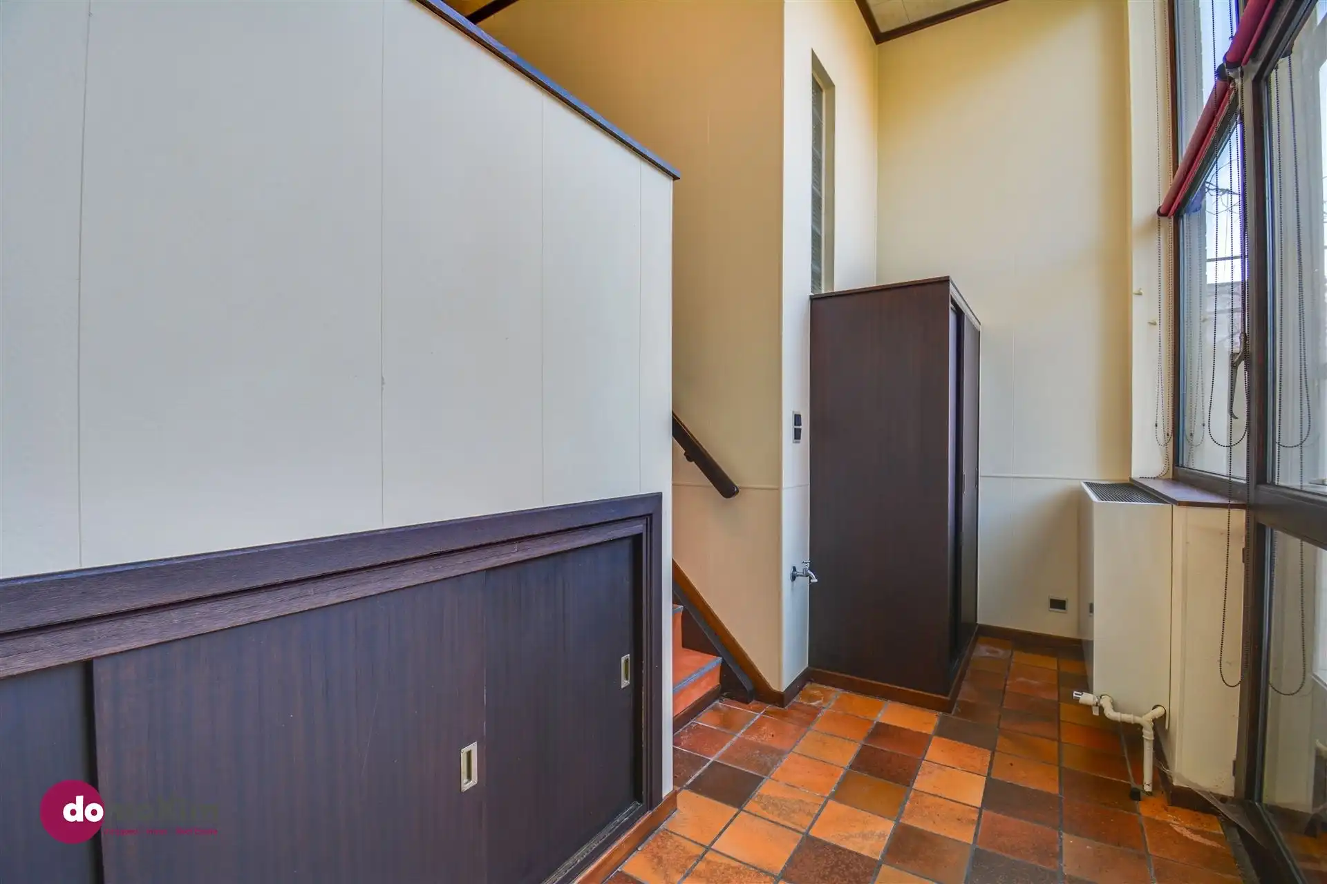 Ruime, karaktervolle stadswoning met twee garageboxen en tuin in Mechelen foto 13