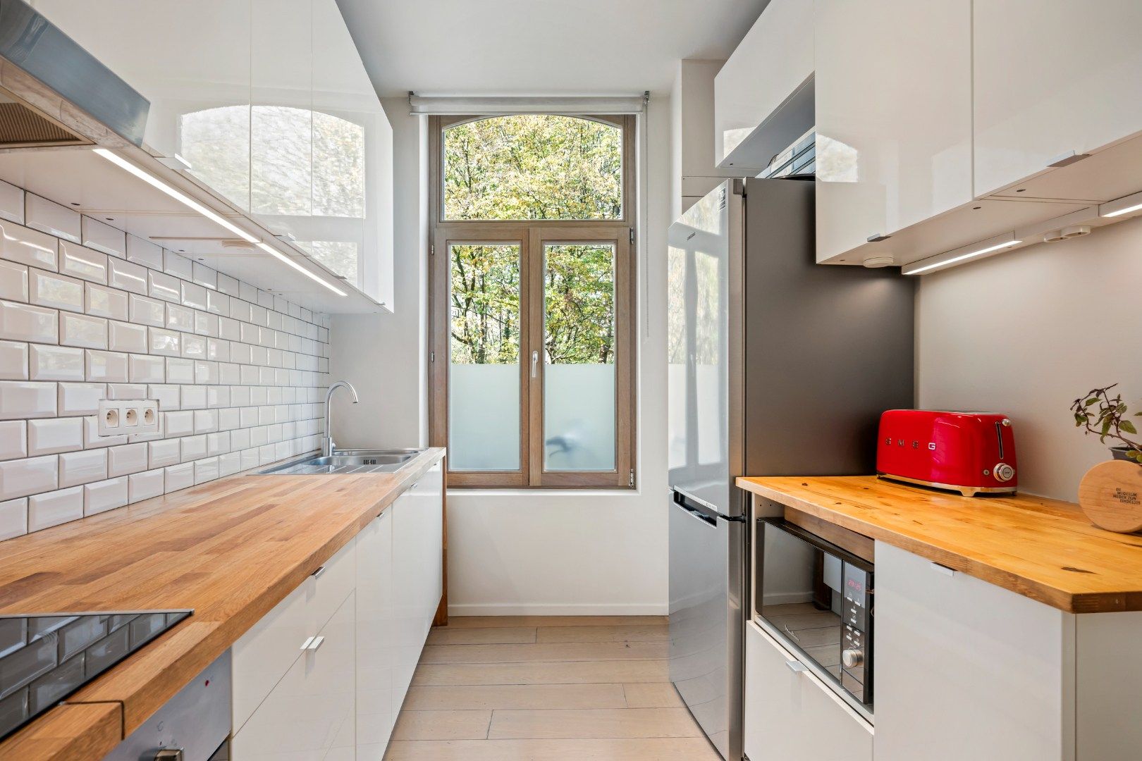 Instapklare, lichtrijke woning met 3 slaapkamers en zonnige tuin in Gent foto 12