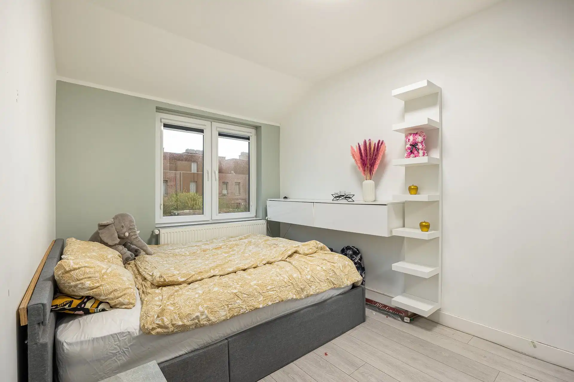 Instapklare gezinswoning met tuin in doodlopende straat! foto 11