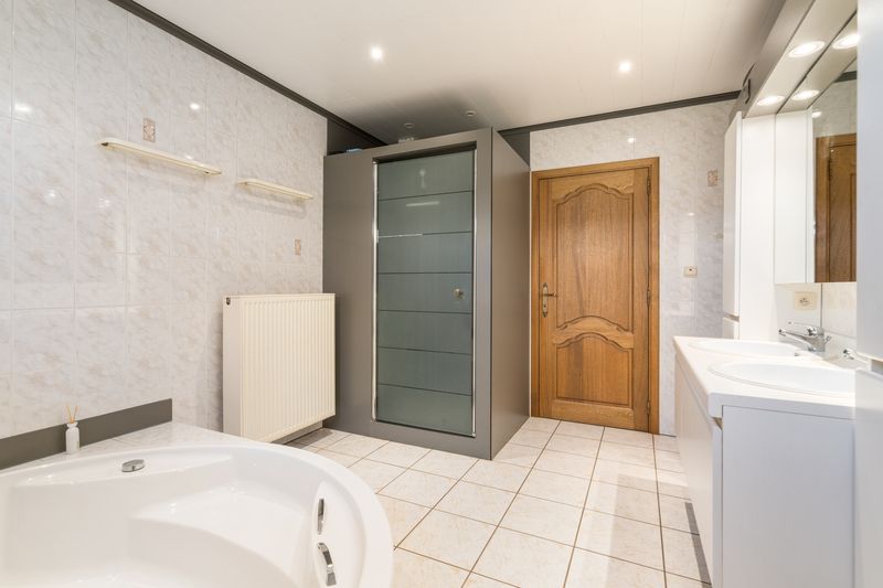 Ruime open bebouwing op 932 m² – instapklare gezinswoning met 310 m² bewoonbare oppervlakte! foto 10