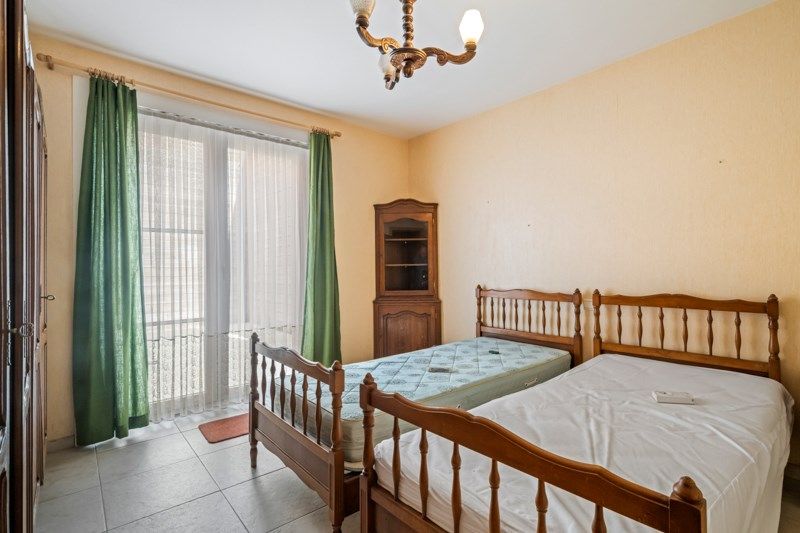 Gelijkvloers appartement met 2 slaapkamers, zonnig terras en een zeer ruime garage! foto 10